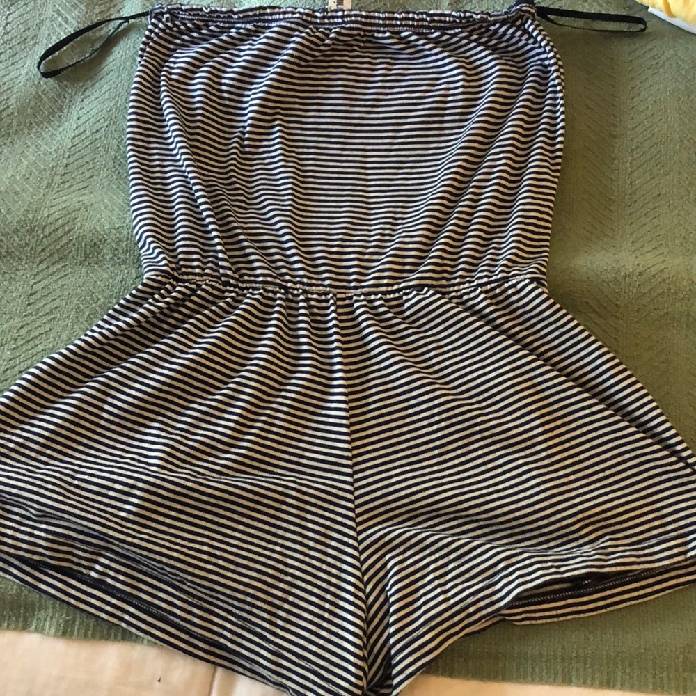 Navy blue and white striped, strapless romper.